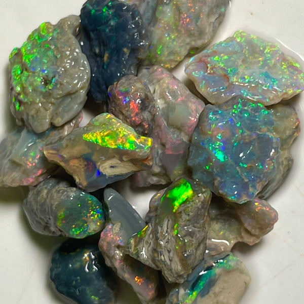 Reds of Lightning Ridge Dark base & Crystal 51.00cts Reds & Multicolours to chase ? Plenty potential 18x12x3 to 9x6x4mm NSW068