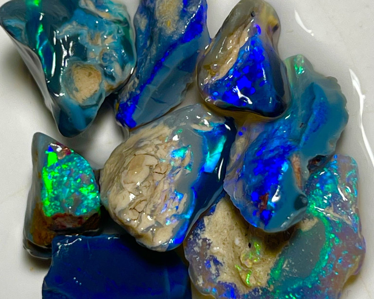 Very Bright Blue /Green dominant fires in this parcel of Black & Dark opal rough 35.75cts Lightning Ridge Material to cut 18x14x3mm to 10x8x7mm NSW184