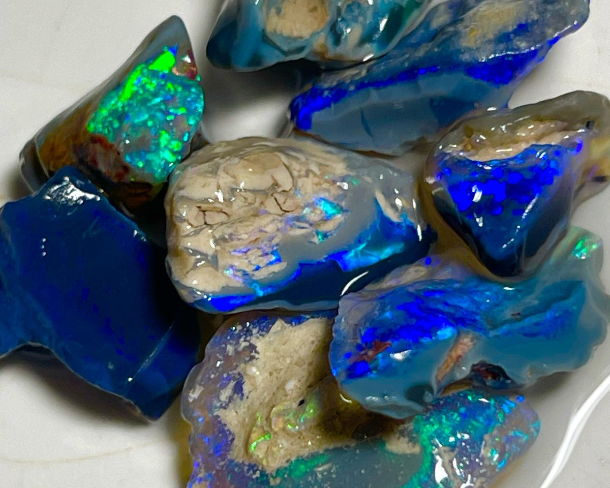 Very Bright Blue /Green dominant fires in this parcel of Black & Dark opal rough 35.75cts Lightning Ridge Material to cut 18x14x3mm to 10x8x7mm NSW184