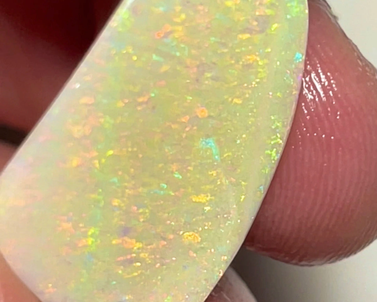 Stunning Big Sized Seam opal rub Lightning Ridge 10.00cts Bright Yellow/Orange dominant fires in Confetti / Floral pattern final shape & Polish to set 25.00x 15.00x 3.00mm  NEW963