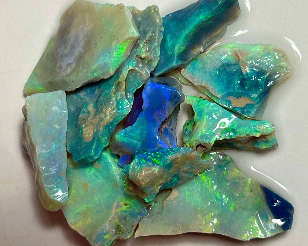 Bling parcel for Cutters 73.00cts Grawin Seams opal rough Full of Stunning High end Bright Multicolour cut yourself some Gems :) 30x15x3 to 14x10x4mm NEW921