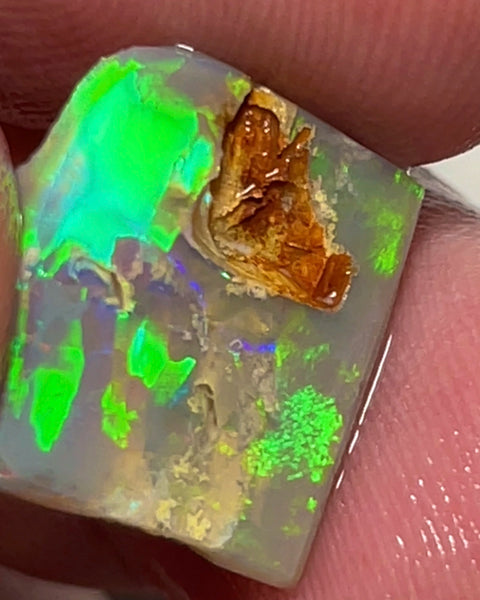 Bright & Colourful Dark base rub rough opal of Lightning Ridge 6.95cts Green dominant Multifires 15.000 x 14.000 x 3.000 mm NSW154