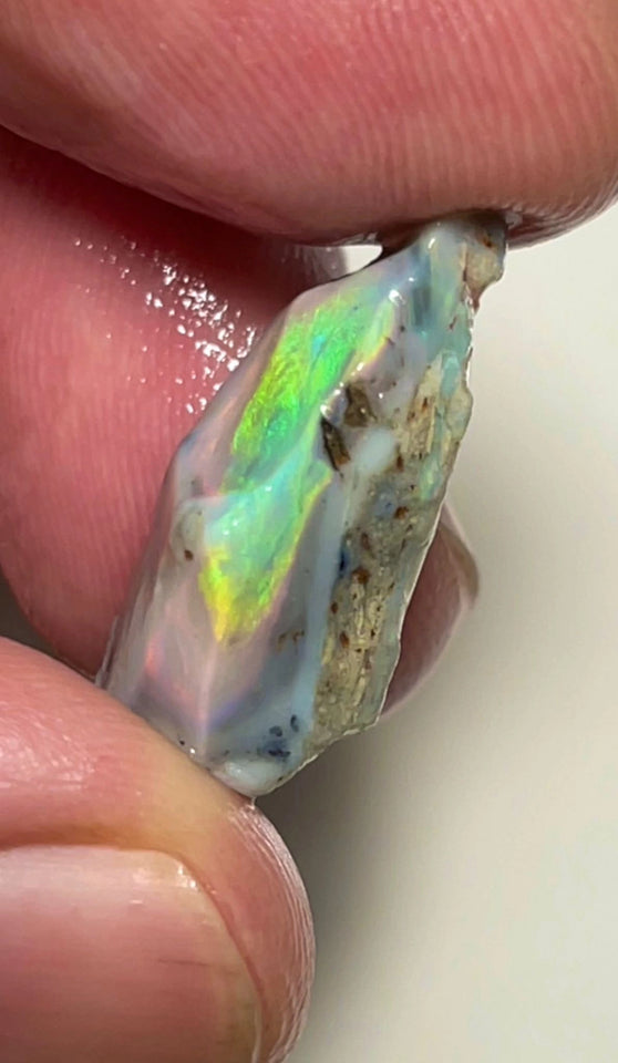 Lightning Ridge Dark Base Seam opal rough 12.75cts Bright Yellow/Orange/Green Dominant fires to chase & polish 22x14x9mm NSW148