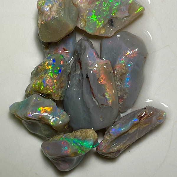 Bright Multicolour cutters rough from Lighting Ridge 36.50cts Yellows/Oranges/Reds here 19x13x4mm to 11x8x3mm NSW183