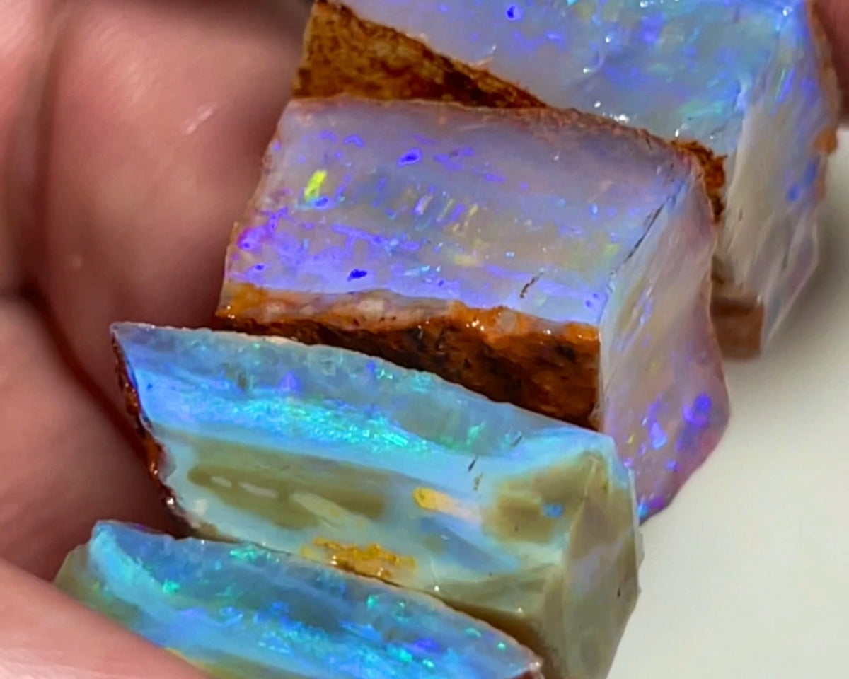 Wow Huge Stack of Gemmy Coober Pedy Seam opal rough 113.50cts Thick bars loaded with Blue dominant fires Yellow/oranges/Red here to cut  20x20x10 to 20x12x7mm NEW926