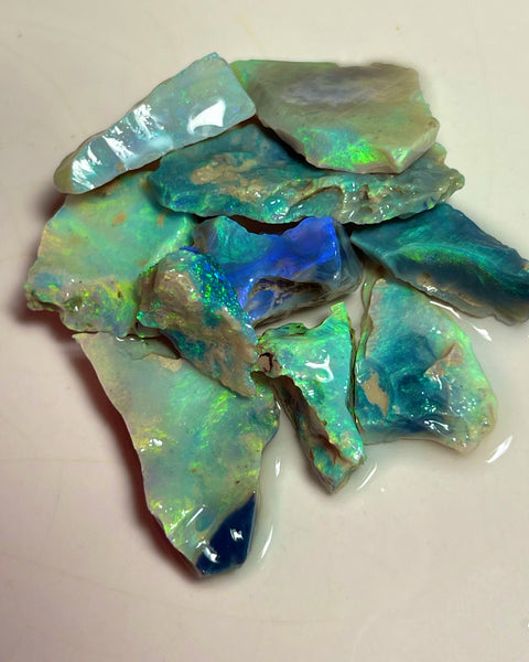 Bling parcel for Cutters 73.00cts Grawin Seams opal rough Full of Stunning High end Bright Multicolour cut yourself some Gems :) 30x15x3 to 14x10x4mm NEW921