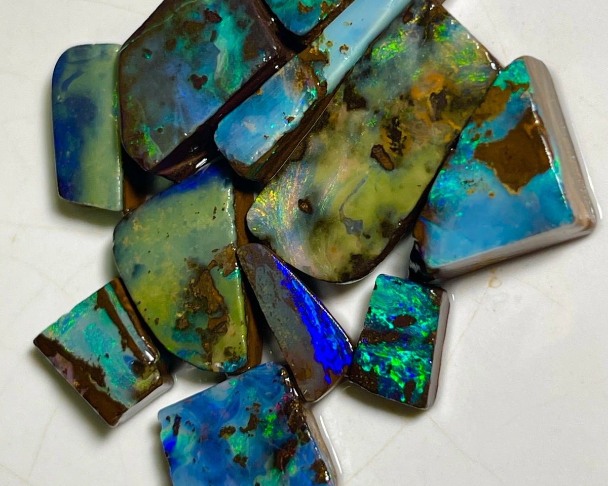 Winton Boulder opal Rubs/rough/preforms parcel 76.50cts Nice faces mostly greens/blues/Yellows 23x10x3 to 9x5x2mm NEW939