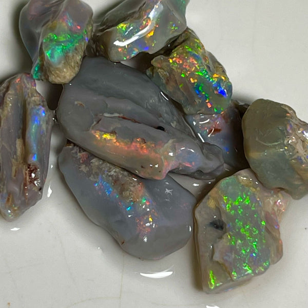 Bright Multicolour cutters rough from Lighting Ridge 36.50cts Yellows/Oranges/Reds here 19x13x4mm to 11x8x3mm NSW183