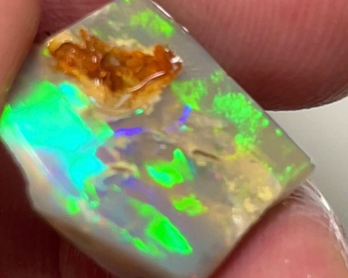 Bright & Colourful Dark base rub rough opal of Lightning Ridge 6.95cts Green dominant Multifires 15.000 x 14.000 x 3.000 mm NSW154