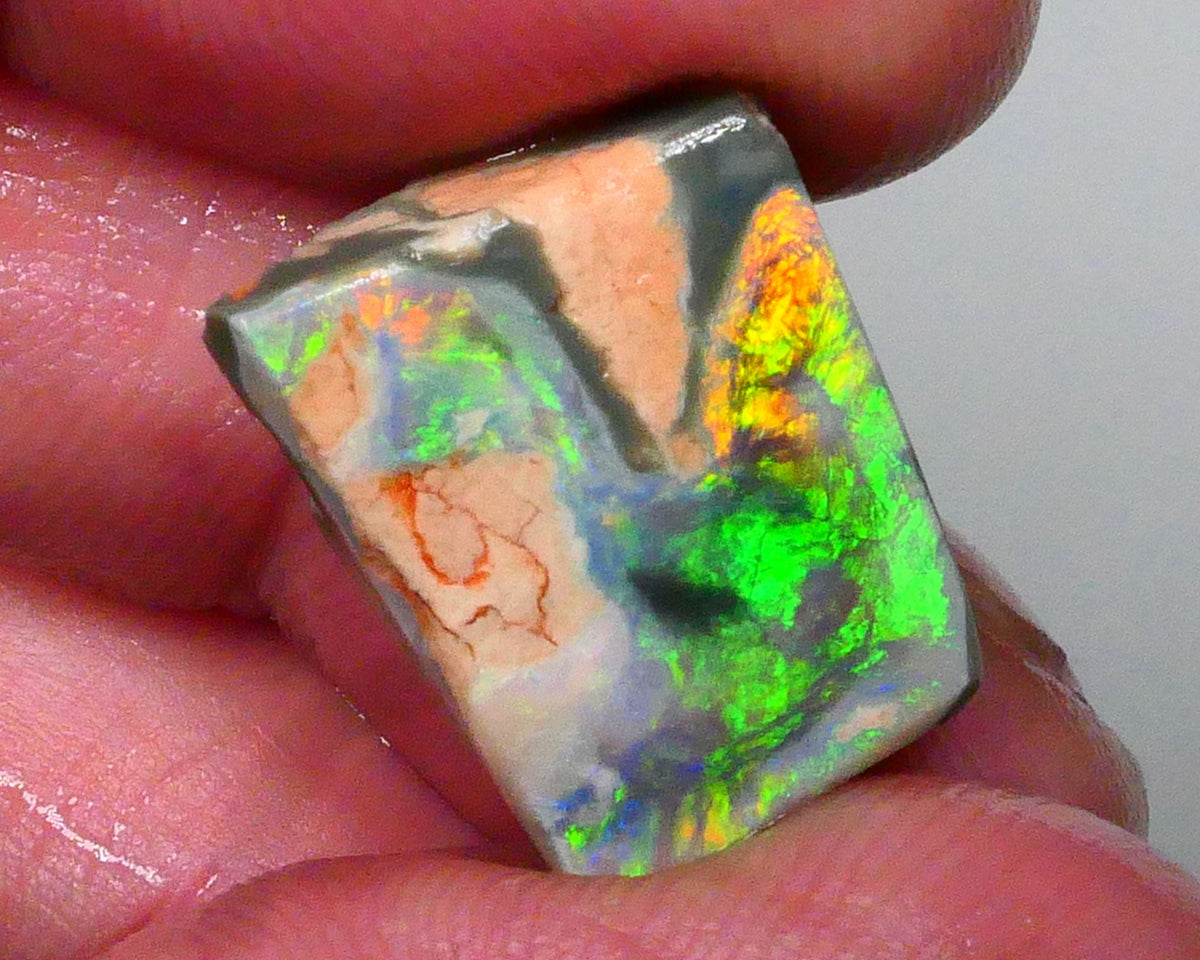 Australian Rub / Rough Dark base opal 13.40cts Lightning Ridge Sharp Very Bright Green / Yellow / Orange dominant Fires 19x15x7mm NSW172
