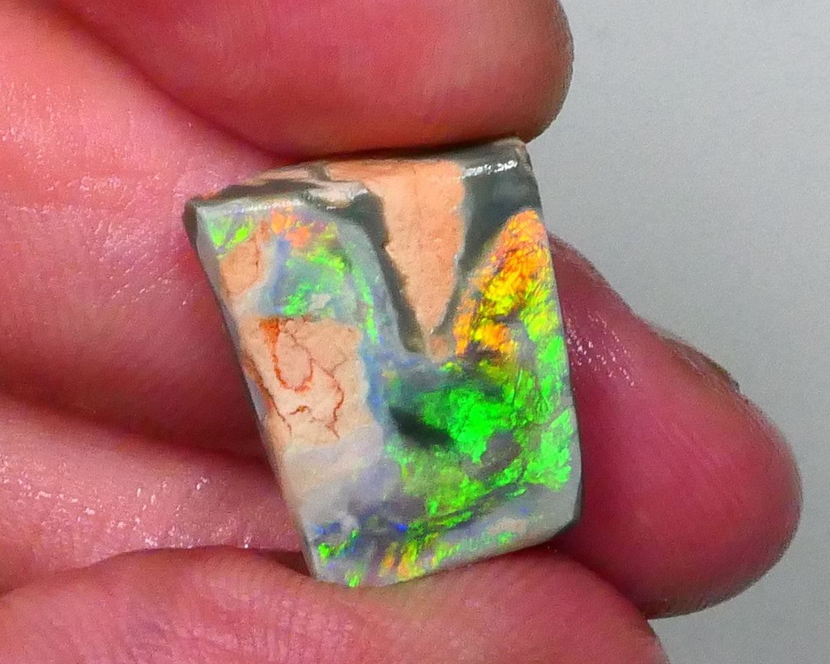 Australian Rub / Rough Dark base opal 13.40cts Lightning Ridge Sharp Very Bright Green / Yellow / Orange dominant Fires 19x15x7mm NSW172