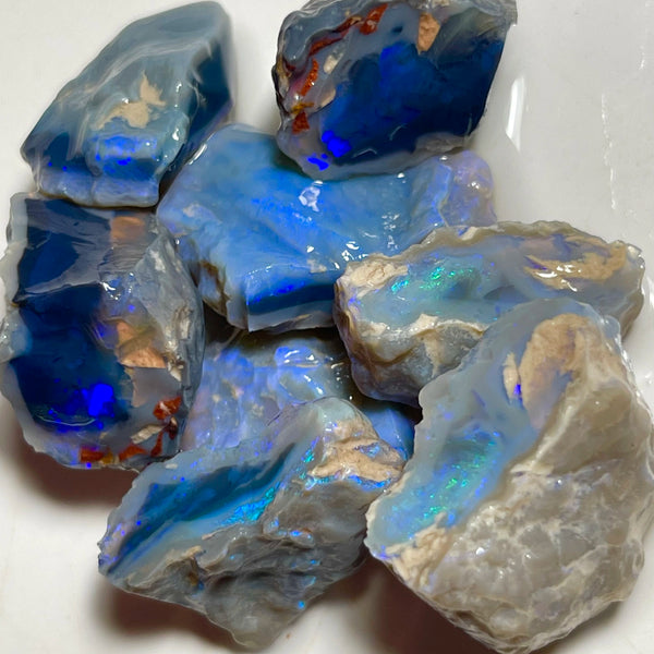 Lightning Ridge Black & Dark Knobby opal splits 135.00cts Mostly blues with some Greens bars sowing potential to cut 23x20x8mm to 17x15x12mm NSW185
