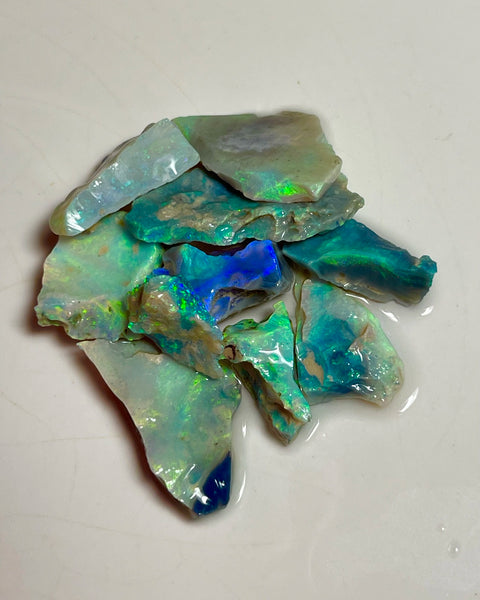 Bling parcel for Cutters 73.00cts Grawin Seams opal rough Full of Stunning High end Bright Multicolour cut yourself some Gems :) 30x15x3 to 14x10x4mm NEW921
