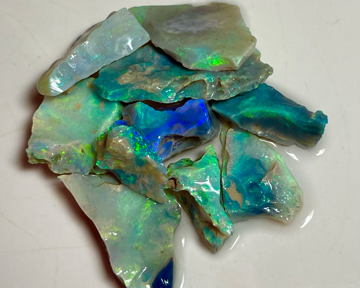 Bling parcel for Cutters 73.00cts Grawin Seams opal rough Full of Stunning High end Bright Multicolour cut yourself some Gems :) 30x15x3 to 14x10x4mm NEW921