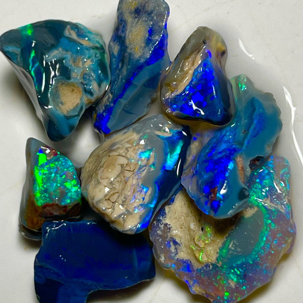 Very Bright Blue /Green dominant fires in this parcel of Black & Dark opal rough 35.75cts Lightning Ridge Material to cut 18x14x3mm to 10x8x7mm NSW184