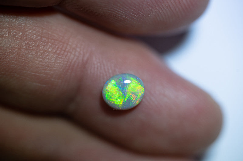 Crystal Opal Gemstone 0.95cts N7 Body Tone B2 Brightness  Broadflash & Brush Stroke pattern with TOP Multi colour fires WSA041021C