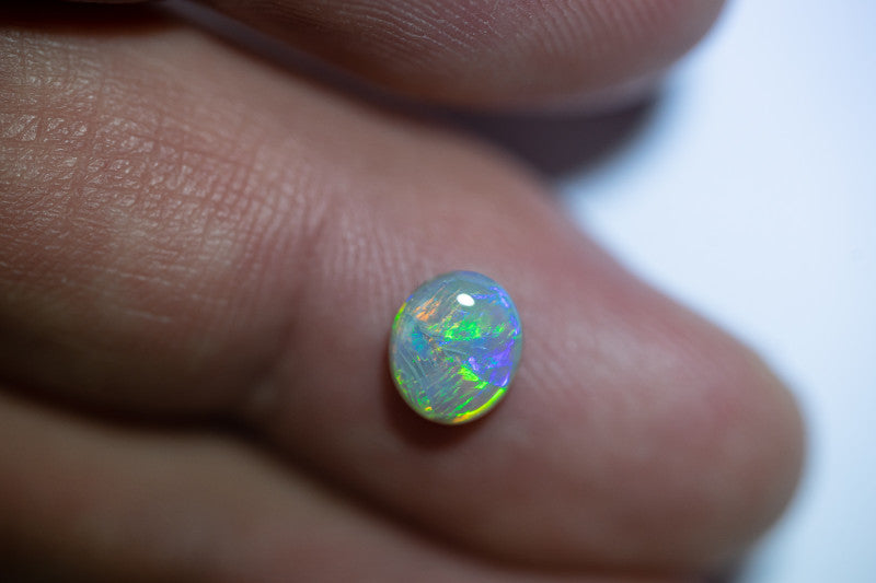Crystal Opal Gemstone 0.95cts N7 Body Tone B2 Brightness  Broadflash & Brush Stroke pattern with TOP Multi colour fires WSA041021C