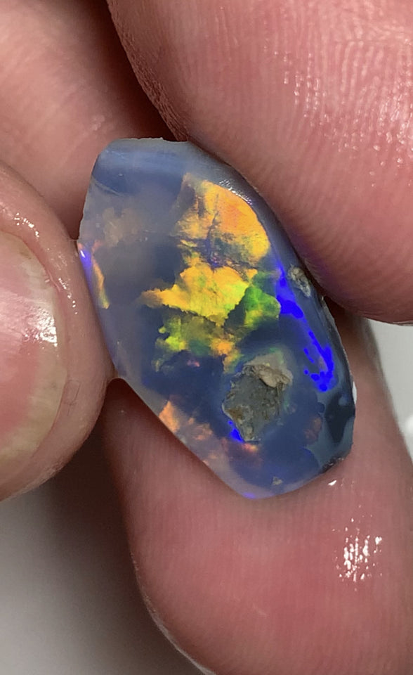Australian Opal Gem Grade Single semi Black 5cts Rub/Rough Super bright Orange/Yellow & Multifires Broad flash / almost Flagstone pattern 22x14x2mm WSN28
