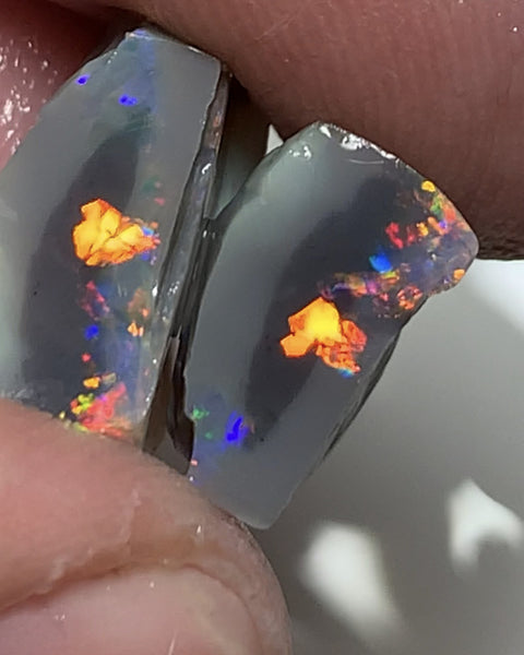Australian Rough Opal Gem Grade semi Black knobby split pair 8.75cts Professional Cutters only! Stunning Bright exposed Reds & Multifires 15x6x9mm & 12x6x5mm WSN27